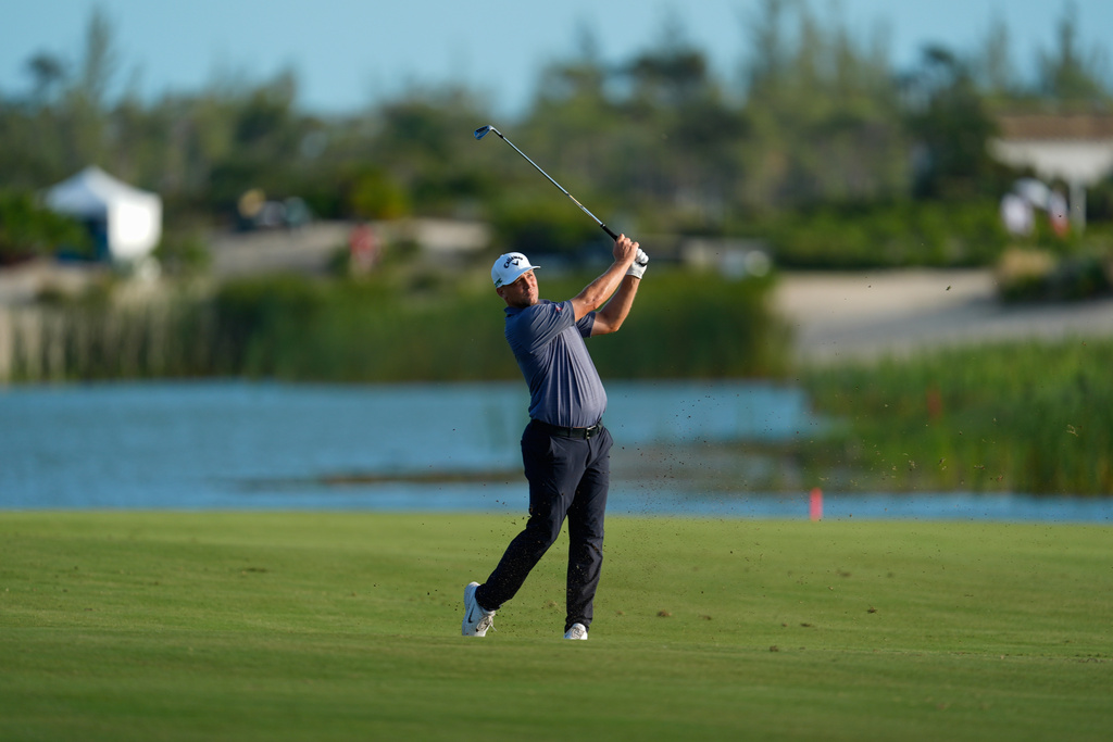 Alex Noren, of Sweden, hits from the fairway on the 18th hole during the final round of the Hero World Challenge PGA Tour at the Albany Golf Club, in New Providence, Bahamas, Sunday, Dec. 7, 2025. (AP Photo/Fernando Llano)