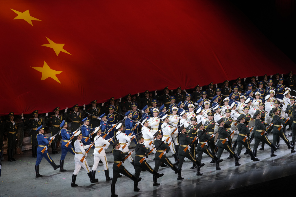 Performers take part in a gala performance entitled "Justice Will Prevail" to commemorate the 80th anniversary of Japan's World War II surrender held at the Great Hall of the People in Beijing, Wednesday, Sept. 3, 2025. (AP Photo/Mahesh Kumar)