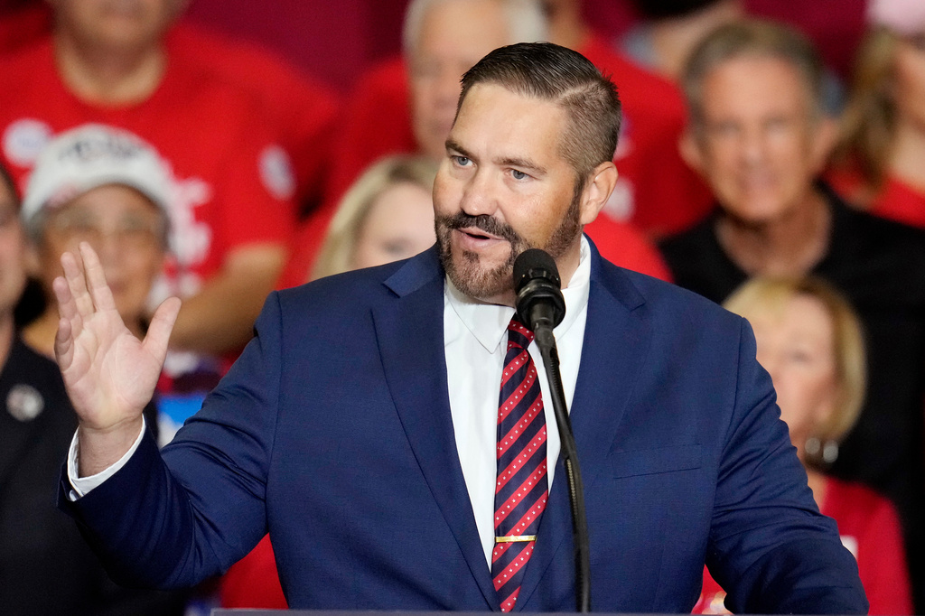 FILE - Maricopa County Recorder candidate Arizona state Rep. Justin Heap, R-Phoenix, speaks during a campaign event, Oct. 22, 2024, in Peoria, Ariz. (AP Photo/Ross D. Franklin, File)