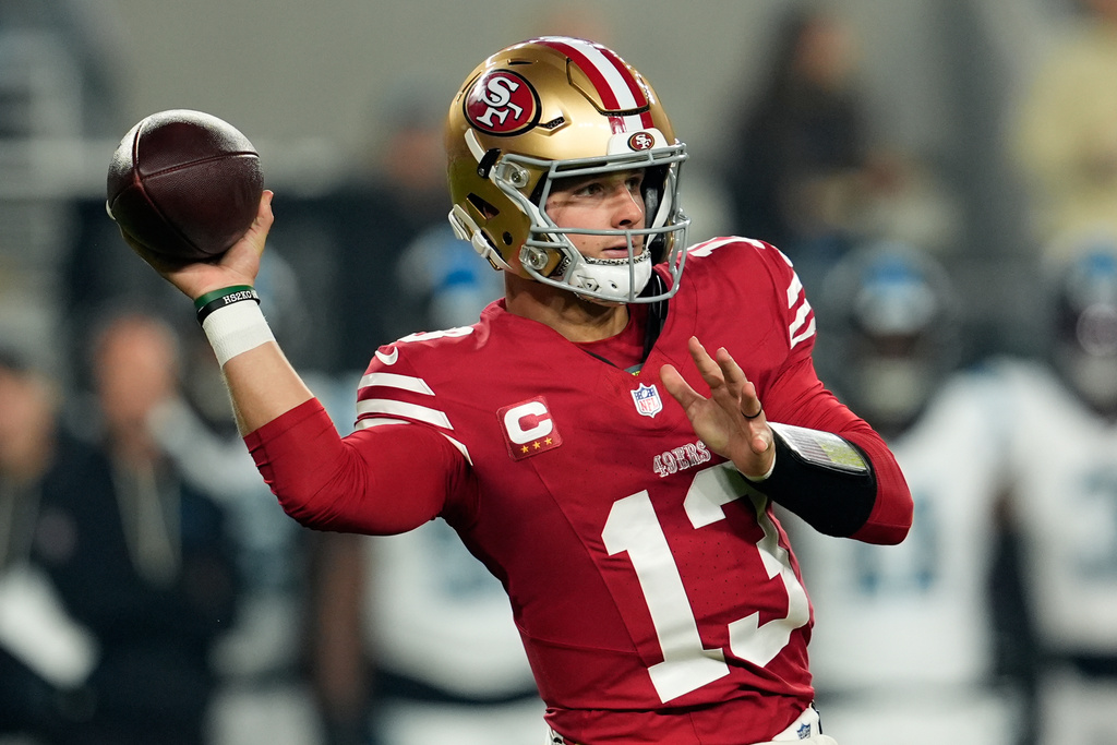 San Francisco 49ers quarterback Brock Purdy passes against the Carolina Panthers during the first half an NFL football game, Monday, Nov. 24, 2025, in Santa Clara, Calif. (AP Photo/Godofredo A. Vásquez)