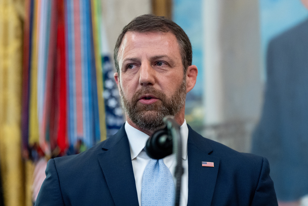 Homeland Security Secretary Markwayne Mullin speaks in the Oval Office of the White House, Tuesday, March 24, 2026, in Washington. (AP Photo/Alex Brandon)