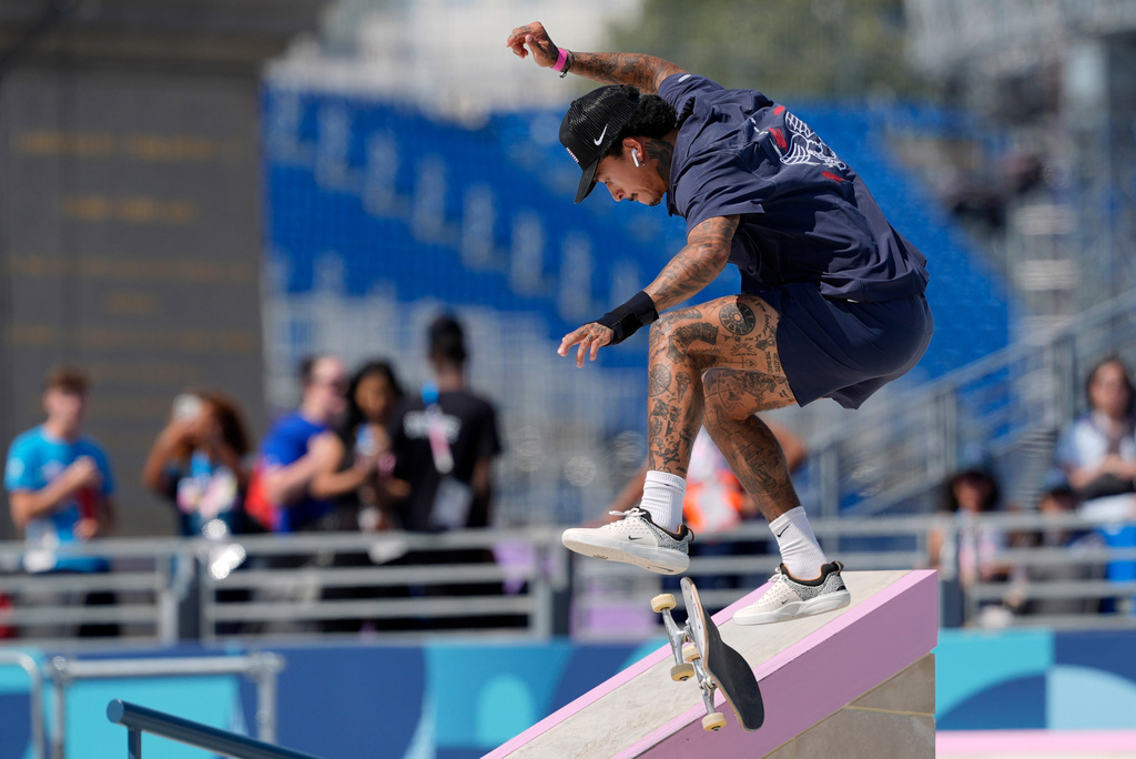 FILE - Nyjah Huston, of the United States, competes in the men's skateboard street preliminaries at the 2024 Summer Olympics, July 29, 2024, in Paris, France. (AP Photo/Frank Franklin II, File)