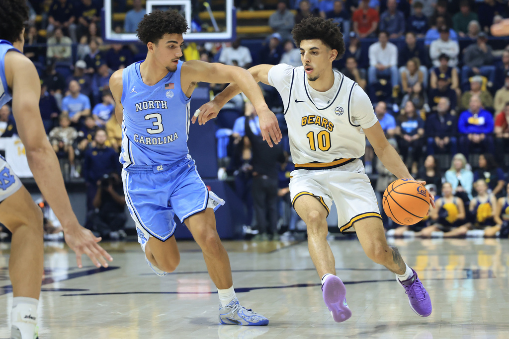 California guard Justin Pippen (10) drives to the basket against North Carolina guard Derek Dixon (3) during the first half of an NCAA college basketball game in Berkeley, Calif., Saturday, Jan. 17, 2026. (AP Photo/Jed Jacobsohn)