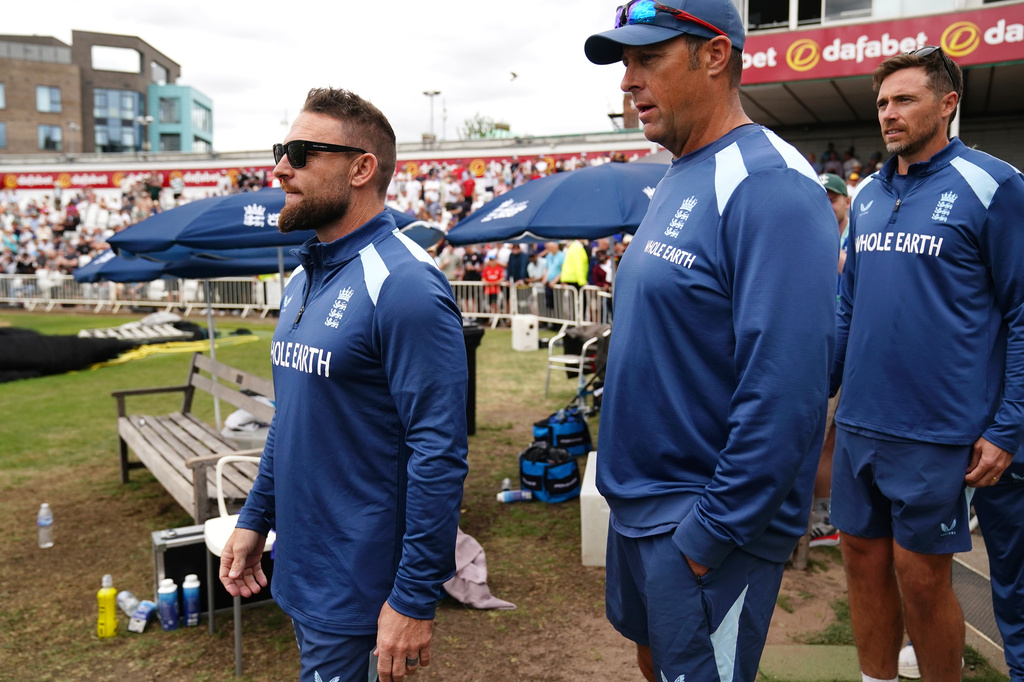 England head coach Brendon McCullum, left, and batting coach Marcus Trescothick stand in dejection as England lose the series against New Zealand on day five of the Third Cricket Test at Trent Bridge Cricket Ground, Nottingham, England, Monday June 29, 2026. (Jacob King/PA via AP)