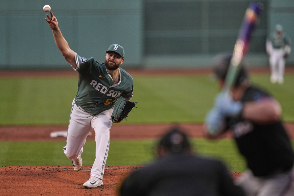 Boston Red Sox pitcher Lucas Giolito delivers during the first inning of a baseball game against the Miami Marlins at Fenway Park, Friday, Aug. 15, 2025, in Boston. (AP Photo/Charles Krupa)
