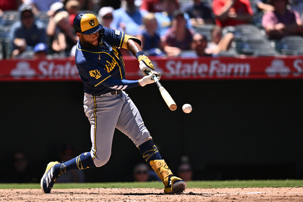 Milwaukee Brewers' Jackson Chourio hits a single during the eighth inning of a baseball game against the Los Angeles Angels, Sunday, Aug. 2, 2026, in Anaheim, Calif. (AP Photo/William Liang)