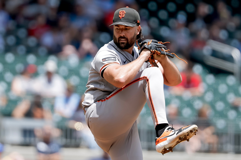 San Francisco Giants pitcher Robbie Ray delivers to an Atlanta Braves batter during the third inning of a baseball game, Wednesday, June 17, 2026, in Atlanta. (AP Photo/Erik S. Lesser)