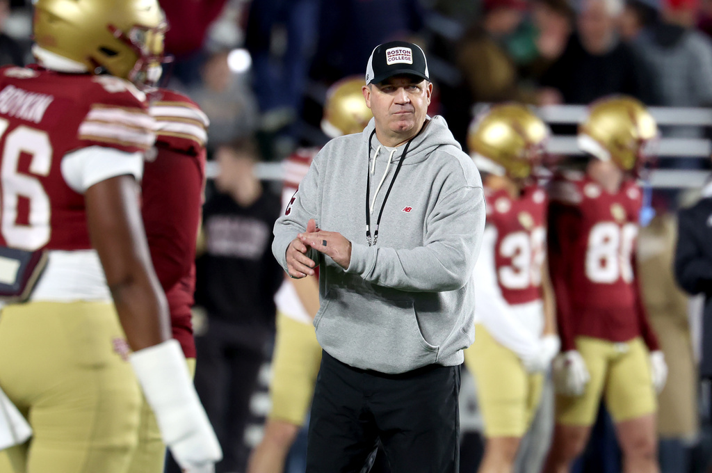 Boston College head coach Bill O'Brien watches his team as they warm up before an NCAA college football game against Clemson, Saturday, Oct. 11, 2025 in Boston. (AP Photo/Mark Stockwell)