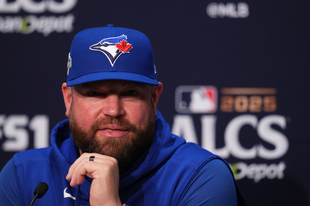 Toronto Blue Jays manager John Schneider speaks during a media availability the day before Game 3 of baseball's American League Championship Series against the Seattle Mariners Tuesday, Oct. 14, 2025, in Seattle. (AP Photo/Lindsey Wasson)