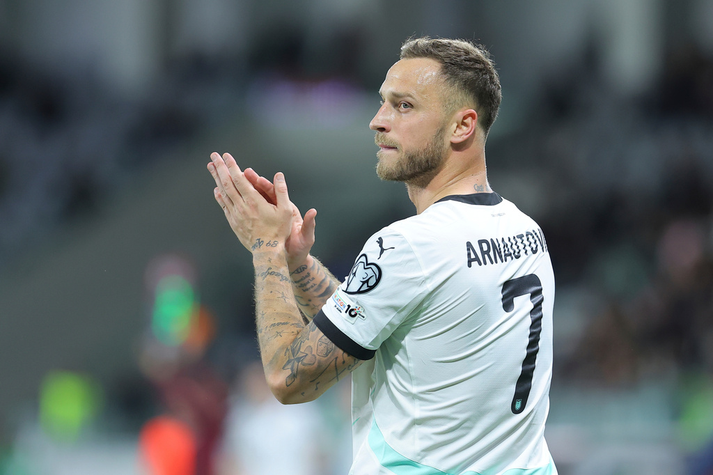 FILE - Austria's Marko Arnautovic applauds during the World Cup 2026 group H qualifying soccer match between Cyprus and Austria, in Limassol, Cyprus, Saturday, Nov. 15, 2025.(AP Photo/Chara Savvidou, File)