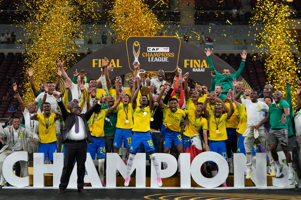 Mamelodi Sundowns' team celebrates after winning the CAF Champions League final soccer match between AS FAR Rabat and Mamelodi Sundowns, in Rabat, Morocco, Sunday, May 24, 2026. (AP Photo/Mosa'ab Elshamy)
