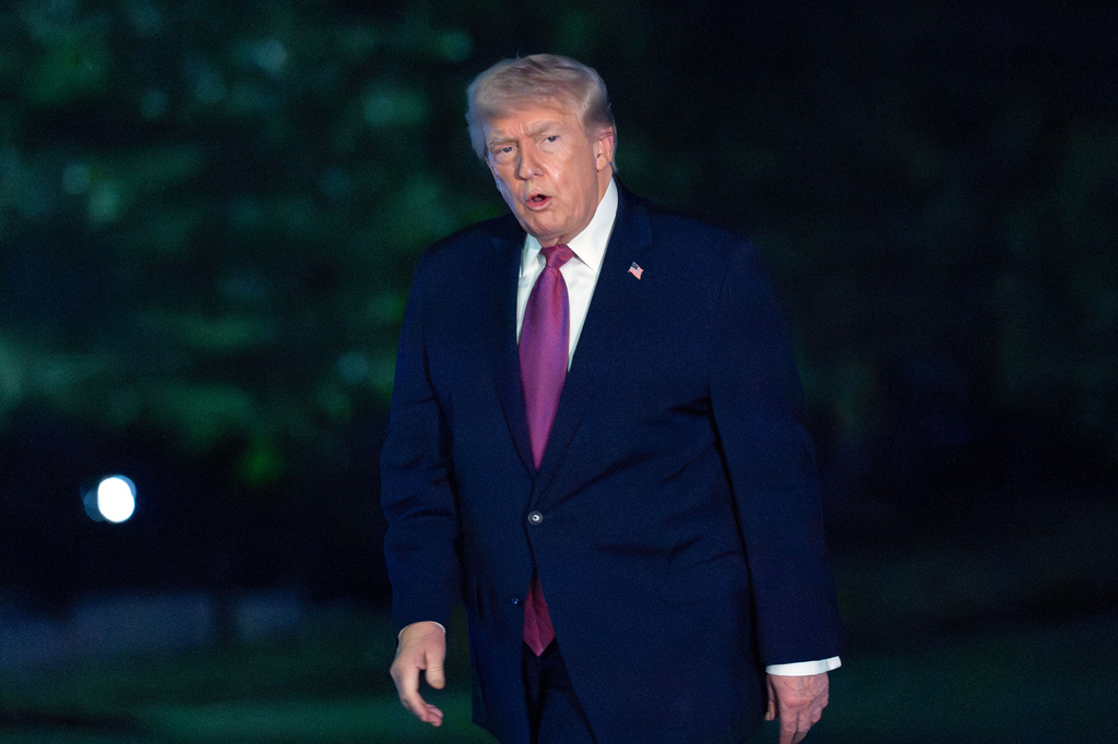 President Donald Trump walks on the South Lawn upon his arrival to the White House, Friday, April 17, 2026, in Washington. (AP Photo/Jose Luis Magana)