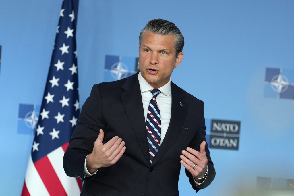 United States Defense Secretary Pete Hegseth speaks during a press statement on arrival for a meeting of NATO defense ministers at NATO headquarters in Brussels, Thursday, June 18, 2026. (AP Photo/Virginia Mayo)