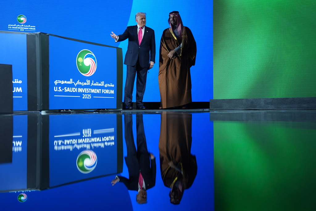 President Donald Trump walks on stage during the Saudi Investment Forum with Saudi Arabia's Crown Prince Mohammed bin Salman at the Kennedy Center, Wednesday, Nov. 19, 2025, in Washington. (AP Photo/Evan Vucci)