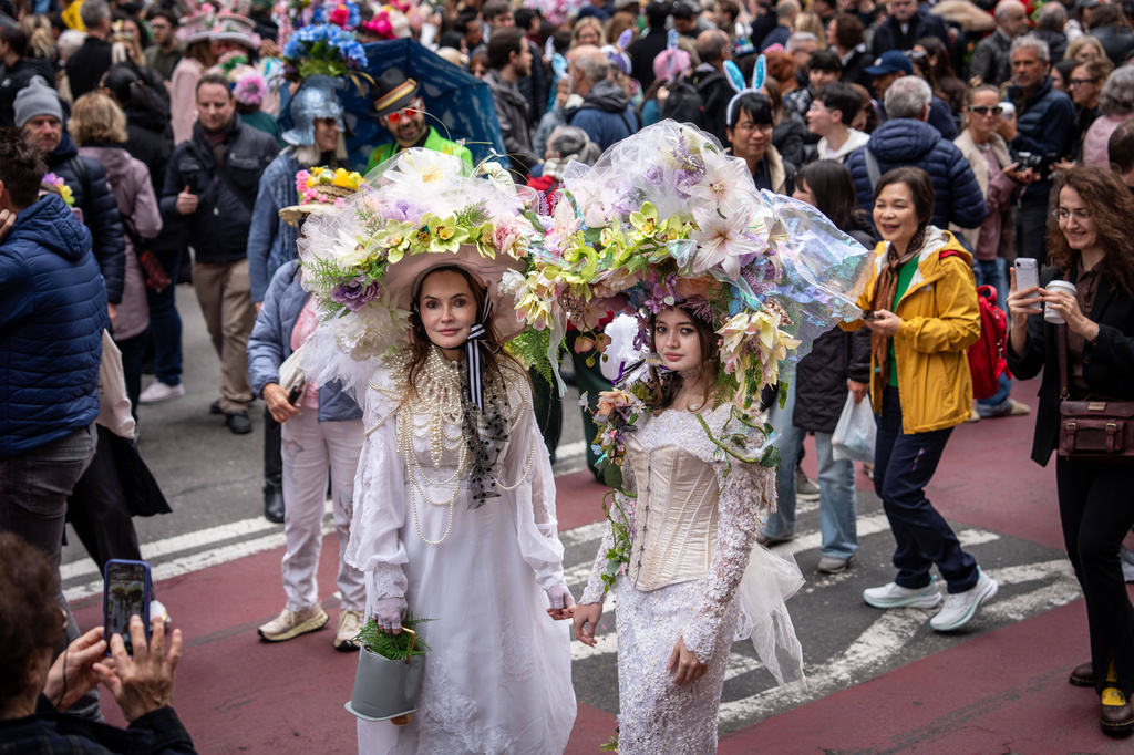 People participate in the Easter Bonnet Parade on Fifth Avenue, Sunday, April 5, 2026, in New York. (AP Photo/Adam Gray)
