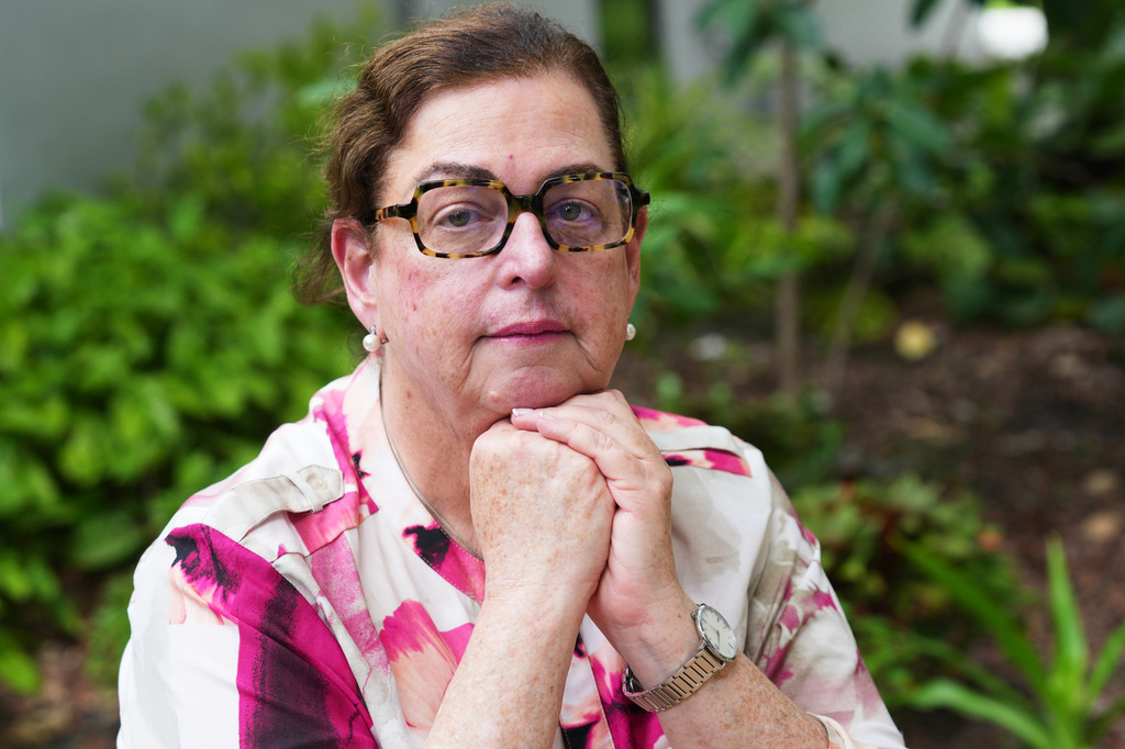 Miriam Singer, CEO of Jewish Community Services of South Florida, pauses as she speaks of the home health workers she had to let go after their TPS expired Wednesday, July 29, 2026, in Miami Beach, Fla. (AP Photo/Marta Lavandier)