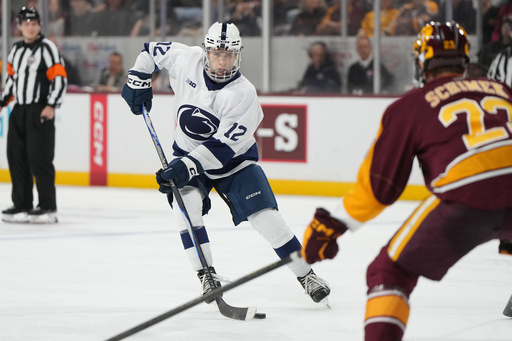 Penn State left winger Gavin McKenna, front left, carries the puck in front of Arizona State Bennett Schimek (23) during the second period of an NCAA college hockey game, Friday, Oct. 3, 2025, in Tempe, Ariz. (AP Photo/Rick Scuteri) Penn State left winger Gavin McKenna, front left, carries the puck in front of Arizona State Bennett Schimek (23) during the second period of an NCAA college hockey game, Friday, Oct. 3, 2025, in Tempe, Ariz. (AP Photo/Rick Scuteri)