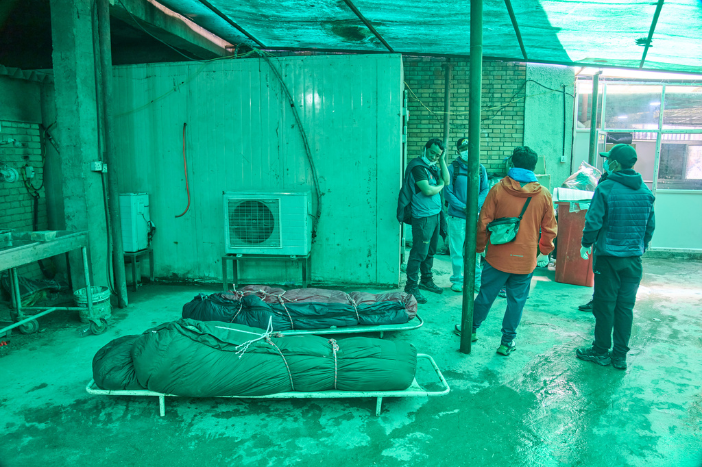 Bodies of two Nepali climbers recovered after an avalanche on Mount Himlung lie at the morgue of a hospital in Kathmandu, Nepal, Monday, Sept. 28, 2026. (AP Photo/Niranjan Shrestha)