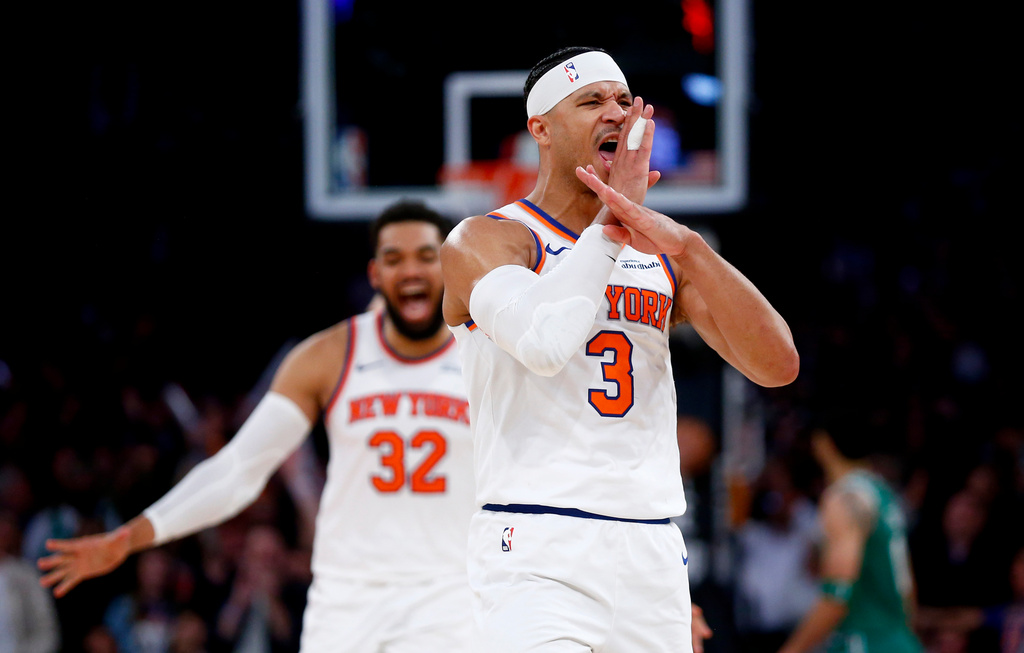 New York Knicks guard Josh Hart (3) reacts after making a 3-point basket in the final minute of an NBA basketball game against the Boston Celtics, Thursday, April 9, 2026, in New York. (AP Photo/John Munson)