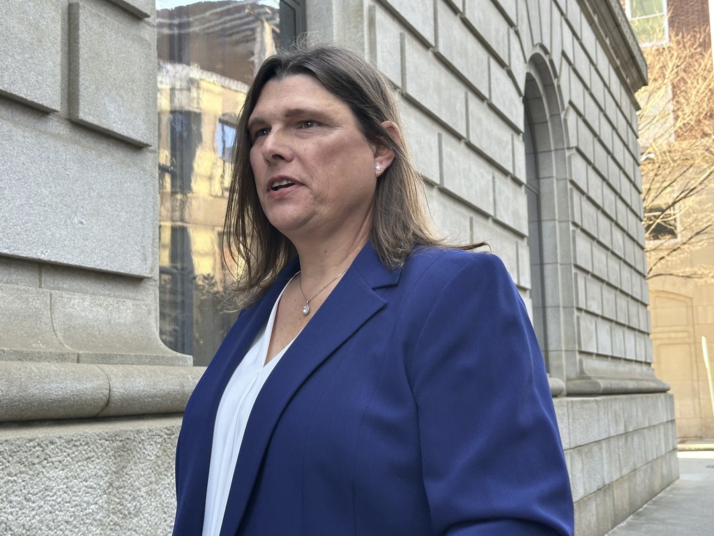 FILE - Anna Lange speaks to reporters on Tuesday, Feb. 4, 2025 in Atlanta after a federal appeals court hearing in which Houston County, Georgia, sought to overturn an order to pay for Lange's gender affirming care. (AP Photo/Jeff Amy, file)
