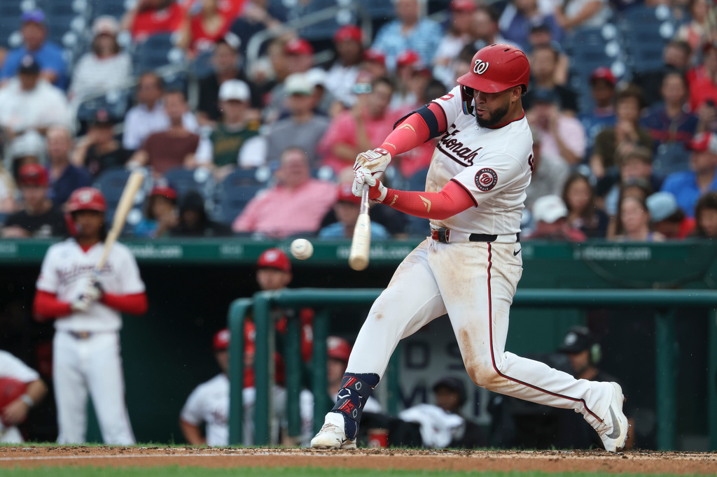 Washington Nationals' Luis García Jr. hits a single off Houston Astros pitcher Tatsuya Imai during the third inning of a baseball game, Tuesday, July 7, 2026, in Washington. (AP Photo/Terrance Williams)