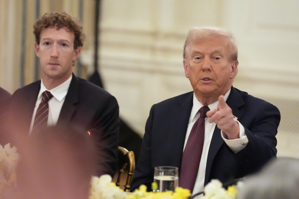 Facebook CEO Mark Zuckerberg listens as President Donald Trump speaks during a dinner in the State Dinning Room of the White House, Thursday, Sept. 4, 2025, in Washington. (AP Photo/Alex Brandon)
