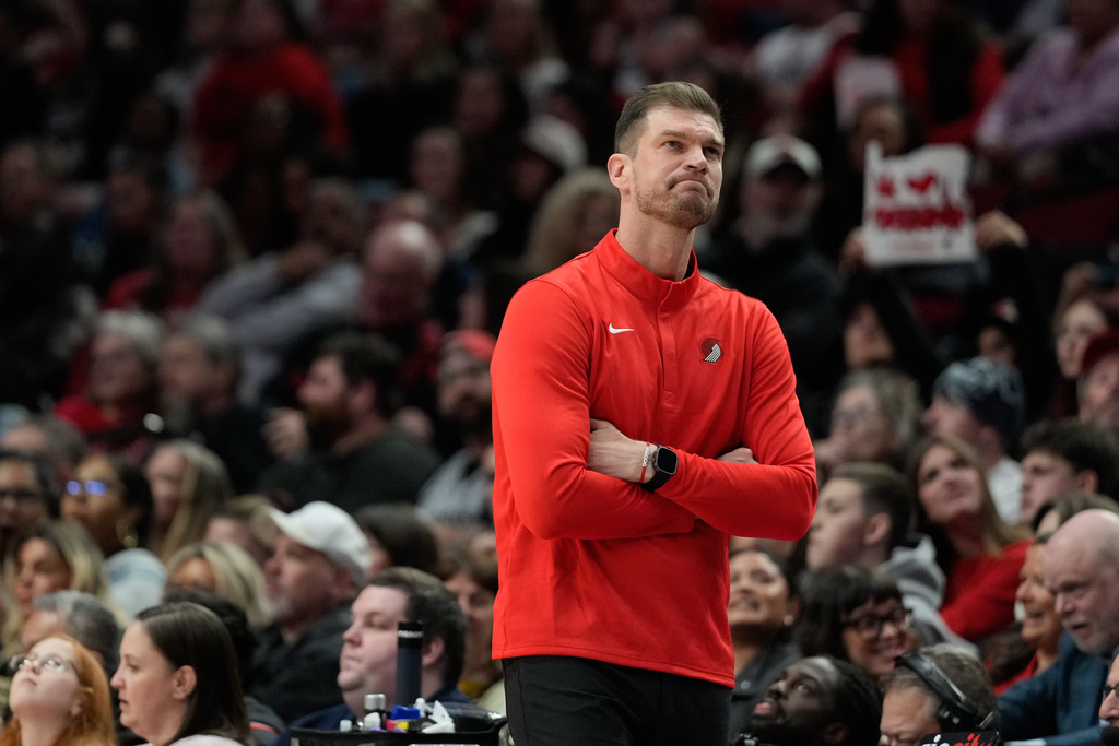 Portland Trail Blazers interim head coach Tiago Splitter reacts during the first half of an NBA basketball game against the Brooklyn Nets, Monday, March 23, 2026, in Portland, Ore. (AP Photo/Jenny Kane)