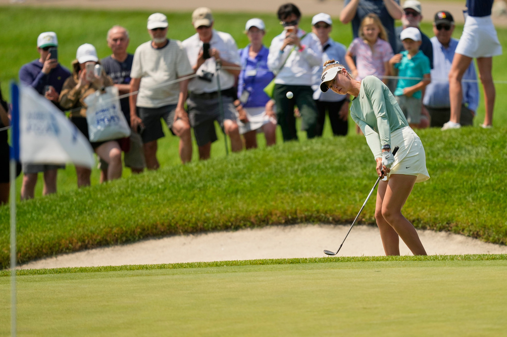 Nelly Korda chips onto the seventh green during the final round of the Women's PGA Championship golf tournament at Hazeltine National Golf Club, Sunday, June 28, 2026, in Chaska, Minn. (AP Photo/Matt York)