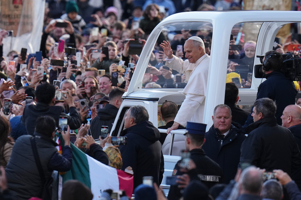 Pope Leo XIV arrives for his weekly general audience in St. Peter's Square, at the Vatican, Wednesday, Nov. 26, 2025. (AP Photo/Alessandra Tarantino)