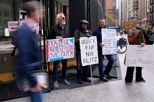 Protesters gather outside federal court in Chicago, Tuesday, Oct. 28, 2025. (AP Photo/Nam Y. Huh) Protesters gather outside federal court in Chicago, Tuesday, Oct. 28, 2025. (AP Photo/Nam Y. Huh)