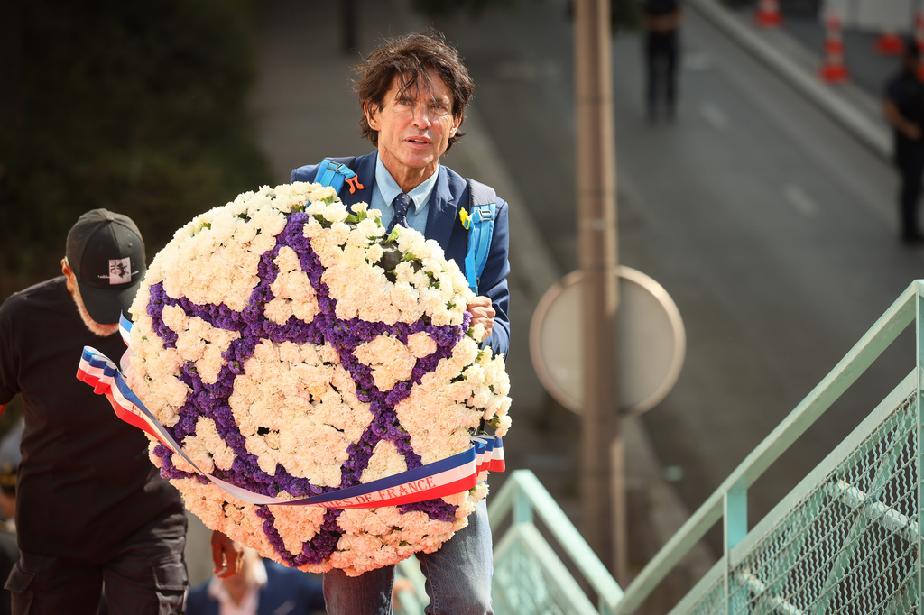 Arno Klarsfeld arrives at ceremony marking the 84th anniversary of the 1942 Vel d'Hiv police roundup, the largest roundup of Jews in France during World War II, and paying tribute to the Righteous Among the Nations of France in Paris, Sunday, July 19, 2026. (AP Photo/Thomas Padilla)