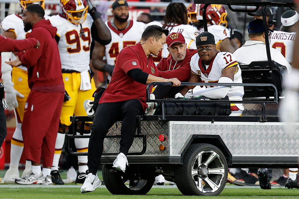 Washington Commanders wide receiver Terry McLaurin (17) is carted off the field during the first half of an NFL football game against the San Francisco 49ers in Santa Clara, Calif., Monday, Oct. 19, 2026. (AP Photo/Kelley L. Cox)