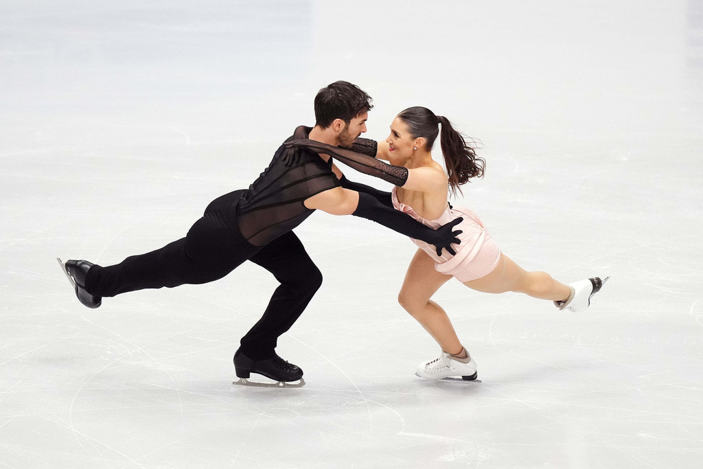 France's Laurence Fournier Beaudry and Guillaume Cizeron compete during the Ice Dance Rhythm Dance segment on day three of the ISU European Figure Skating Championships in Sheffield, England, Friday, Jan. 16, 2026. (Mike Egerton/PA via AP)
