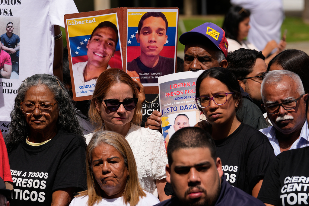 Relatives of political prisoners gather at the Central University of Venezuela to call for their release in Caracas, Venezuela, Tuesday, Jan. 13, 2026. (AP Photo/Matias Delacroix)