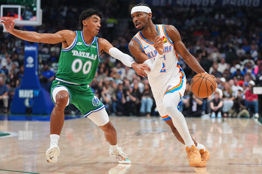 Oklahoma City Thunder guard Shai Gilgeous-Alexander, right, drives against Dallas Mavericks guard Max Christie (00) during the first half of an NBA basketball game in Dallas, Monday, Oct. 27, 2025. (AP Photo/LM Otero) Oklahoma City Thunder guard Shai Gilgeous-Alexander, right, drives against Dallas Mavericks guard Max Christie (00) during the first half of an NBA basketball game in Dallas, Monday, Oct. 27, 2025. (AP Photo/LM Otero)