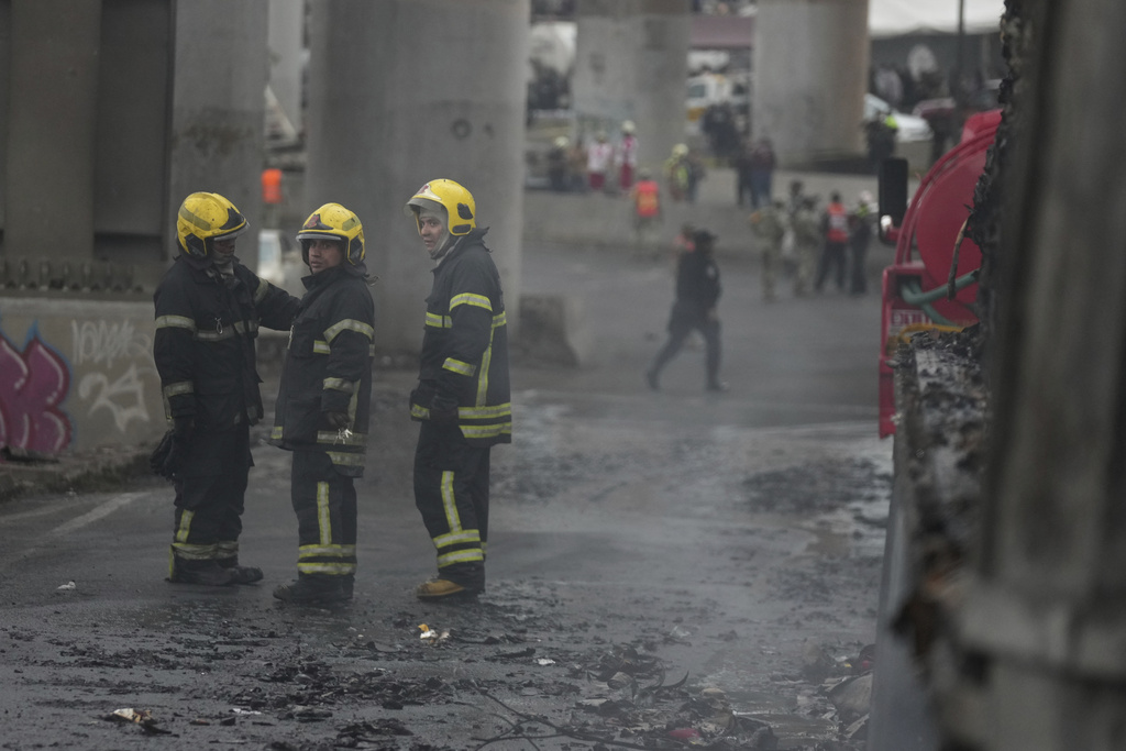 Firefighters work the scene following a gas tank explosion in Mexico City, Wednesday, Sept. 10, 2025. (AP Photo/Fernando Llano)