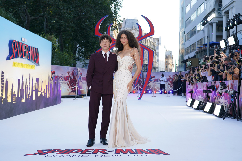 Tom Holland and Zendaya pose for photographers upon arrival at the 'Spider-Man: Brand New Day' premiere in London, England, Wednesday, July 29, 2026. (Photo by Alberto Pezzali/Invision/AP)