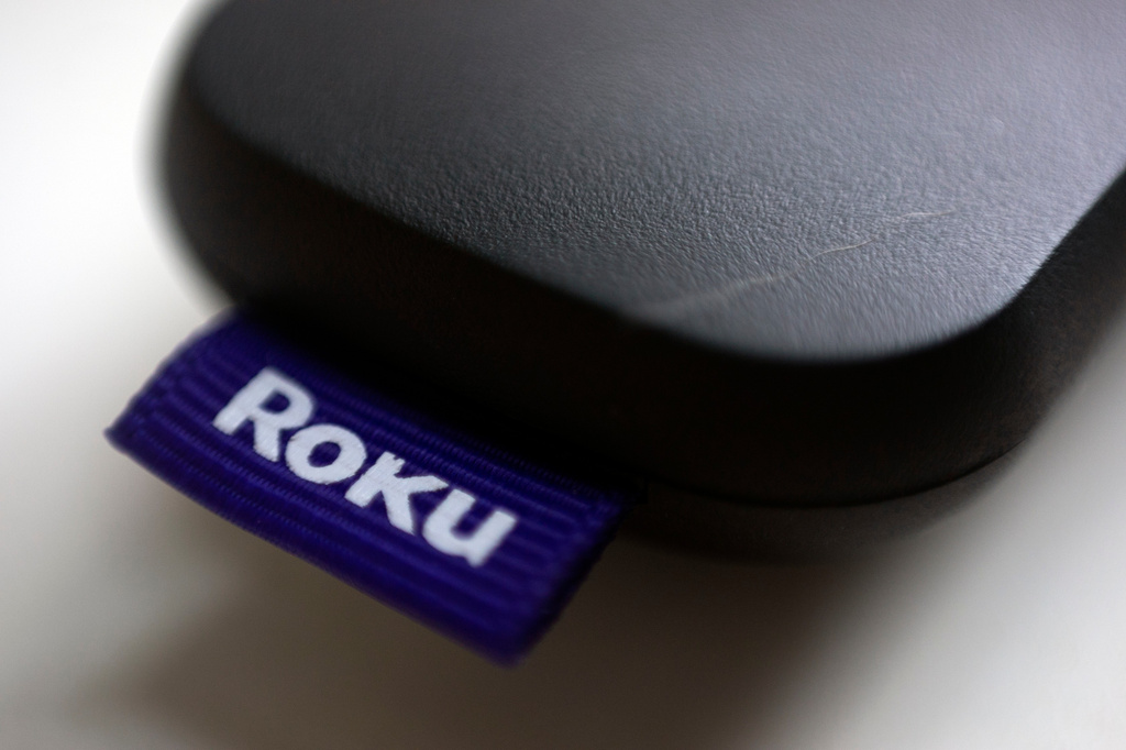 FILE - This Aug. 13, 2020 file photo shows a logo for Roku on a remote control in Portland, Ore. (AP Photo/Jenny Kane, file)