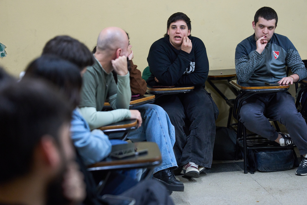 University students meet in a classroom to discuss debt in Buenos Aires, Argentina, Wednesday, Aug. 26, 2026. (AP Photo/Rodrigo Abd)