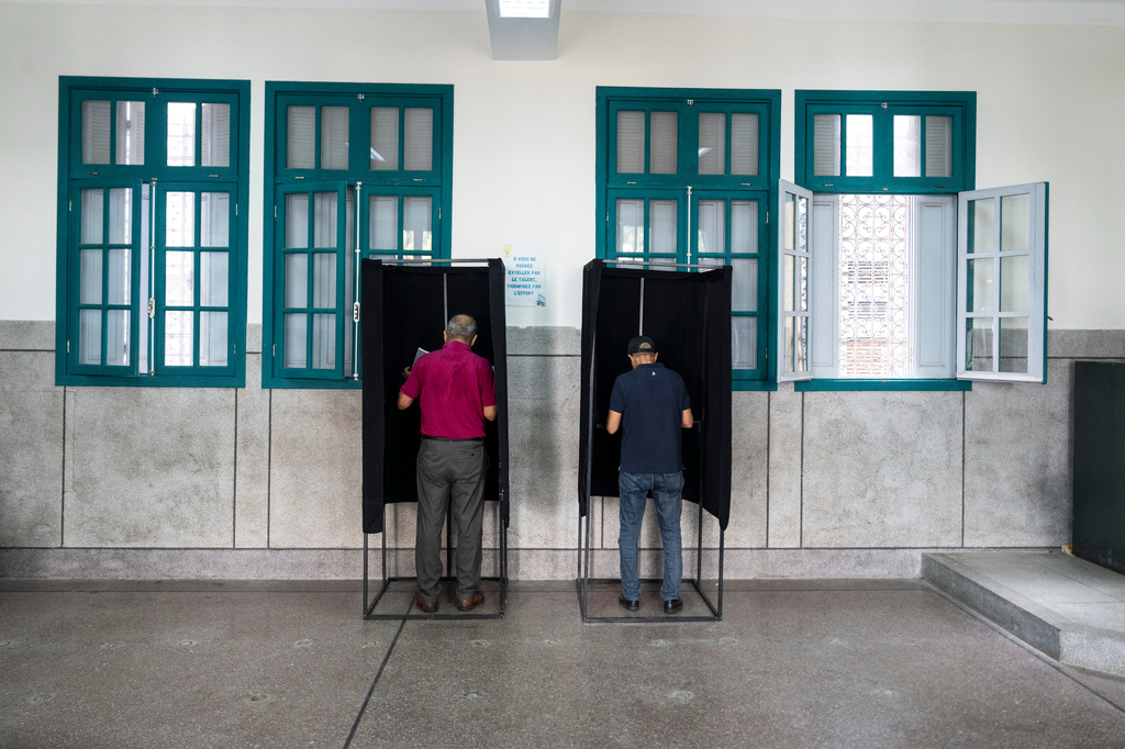 People cast their vote inside a polling station during the legislative elections in Rabat, Morocco, Wednesday, Sept. 23, 2026. (AP Photo/Mosa'ab Elshamy)