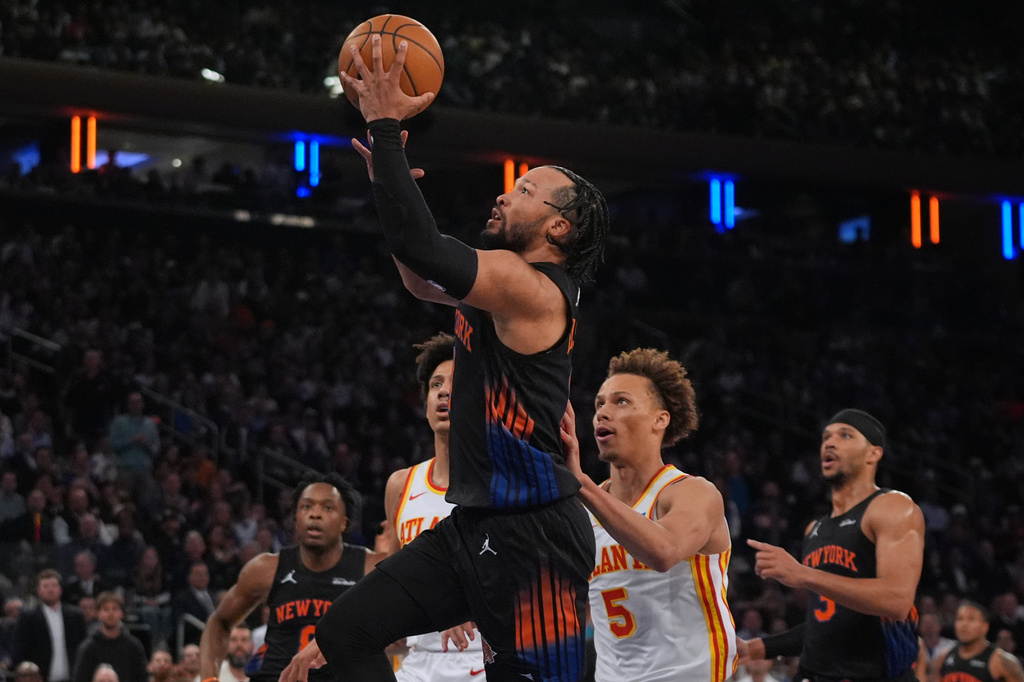 New York Knicks' Jalen Brunson drives past Atlanta Hawks' Dyson Daniels (5) during the first half in Game 5 of a first-round NBA playoffs basketball series, Tuesday, April 28, 2026, in New York. (AP Photo/Frank Franklin II)