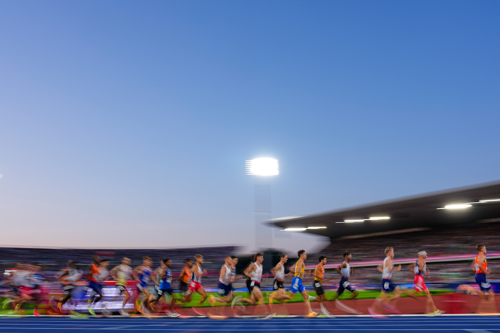 Athletes race in the men's 10,000 meters final at the European Athletics Championships in Birmingham, England, Saturday, Aug. 15, 2026. (AP Photo/Petr David Josek)