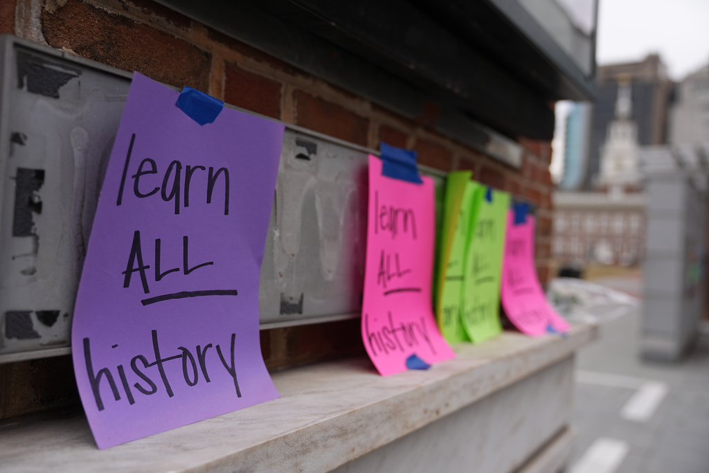 Shown are posted signs on the locations of the now removed explanatory panels that were part of an exhibit on slavery at President's House Site in Philadelphia, Friday, Jan. 23, 2026. (AP Photo/Matt Rourke)