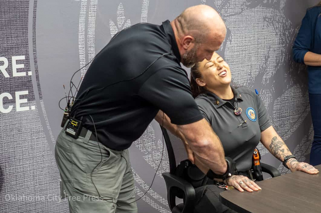 This photo provided by the Oklahoma City Free Press shows Justin Morris demonstrating the G.L.O.V.E. at the Oklahoma County Detention Center in Oklahoma City, March 22, 2023. (Brett Dickerson/Oklahoma City Free Press via AP)