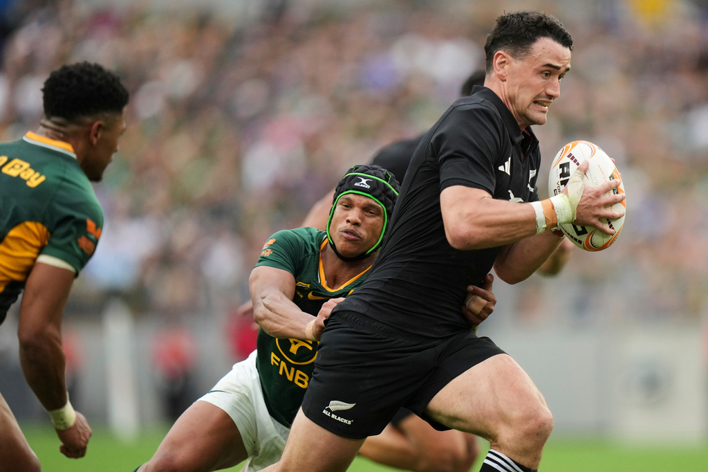 New Zealand's Will Jordan runs towards the try line during their rugby international in Baltimore, USA, Saturday, Sept. 12, 2026. (AP Photo/Stephanie Scarbrough)