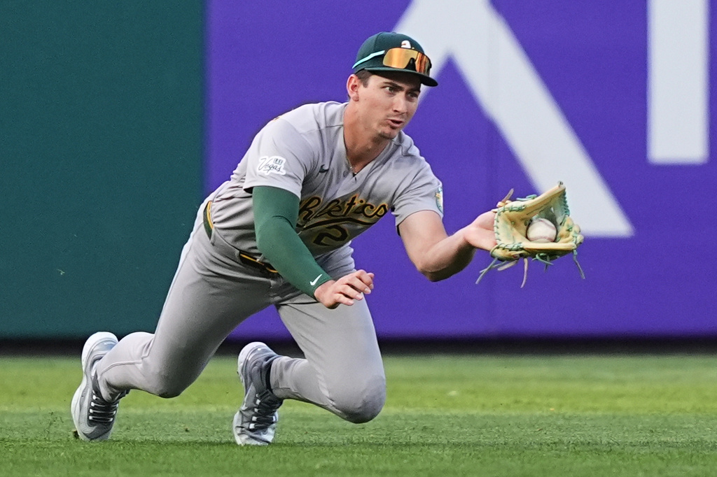 Athletics' Tyler Soderstrom catches a line out hit by Philadelphia Phillies' Trea Turner during the first inning of a baseball game, Tuesday, May 5, 2026, in Philadelphia. (AP Photo/Matt Rourke)