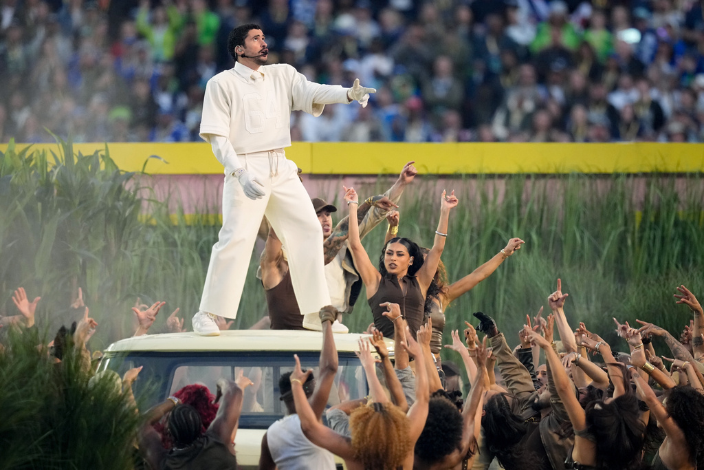 Bad Bunny performs during halftime of the NFL Super Bowl 60 football game between the New England Patriots and the Seattle Seahawks, Sunday, Feb. 8, 2026, in Santa Clara, Calif. (AP Photo/Julio Cortez)