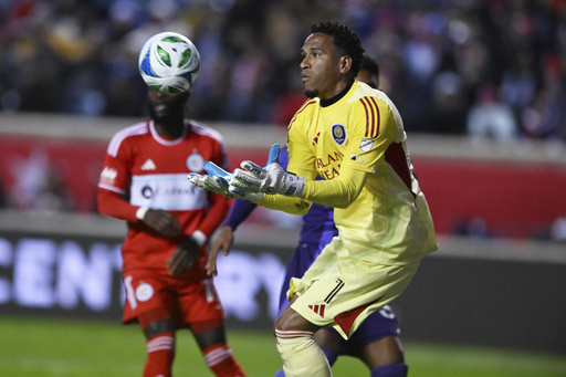 Orlando City SC goalie Pedro Gallese makes a save during the the first half of an MLS soccer wild-card playoff match against Chicago Fire FC, Wednesday, Oct. 22, 2025, in Bridgeview, Ill. (AP Photo/Paul Beaty) Orlando City SC goalie Pedro Gallese makes a save during the the first half of an MLS soccer wild-card playoff match against Chicago Fire FC, Wednesday, Oct. 22, 2025, in Bridgeview, Ill. (AP Photo/Paul Beaty)