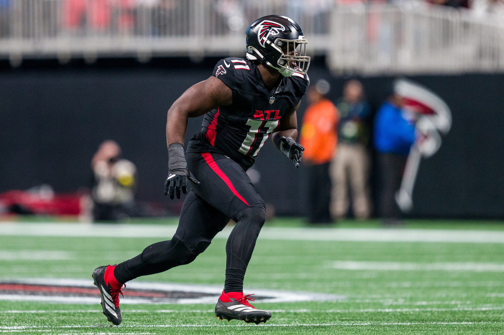 File- Atlanta Falcons linebacker Jalon Walker (11) works during the first half of an NFL football game against the New Orleans Saints, Sunday, Jan. 4, 2026, in Atlanta. (AP Photo/Danny Karnik,File)