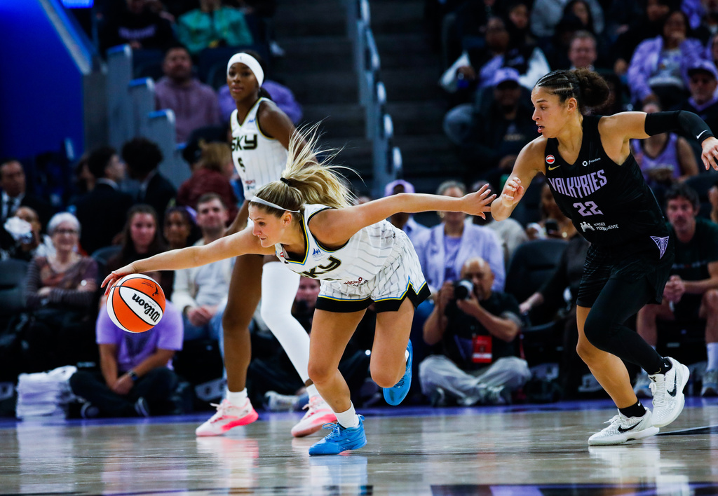 Golden State Valkyries guard Veronica Burton (22) defends Chicago Sky guard Jacy Sheldon (0) in the second quarter of a basketball match at Chase Center in San Francisco on Wednesday, May 13, 2026.(Yalonda M. James/San Francisco Chronicle via AP)
